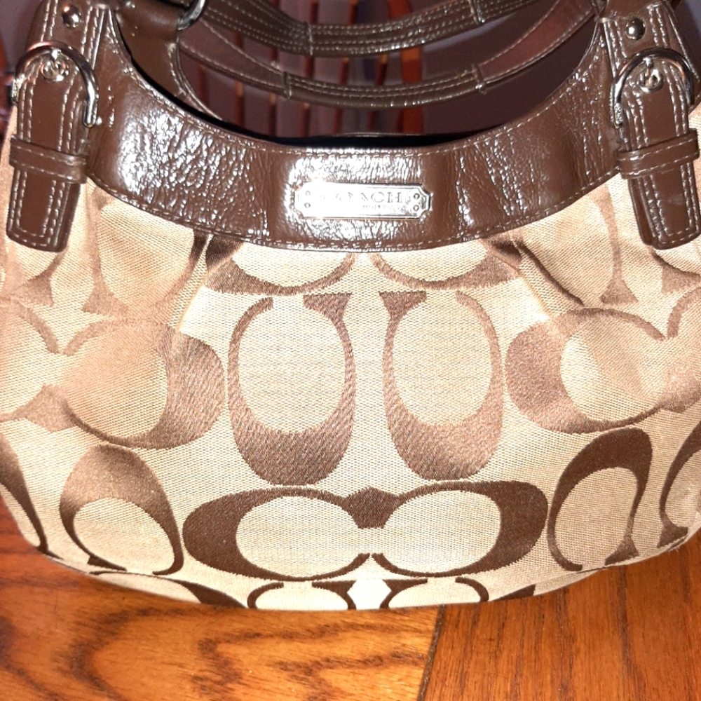 Brown coach signature hobo bag